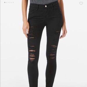 Frame black distressed le skinny de Jeanne jeans